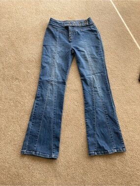 High-Rise Blue Flare Jeans with Button Waist